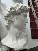 A LARGE CONTEMPORARY MOULDED BUST AFTER THE ANTIQUE.