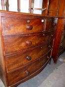 AN EARLY VICTORIAN MAHOGANY BOW FRONT CHEST OF DRAWERS ON SPLAYED BRACKET FEET