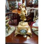 A 19TH.C.FRENCH VERIGATED MARBLE CASED MANTLE CLOCK SURMOUNTED WITH A GILT FIGURE OF A GIRL,