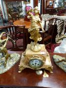 A 19TH.C.FRENCH VERIGATED MARBLE CASED MANTLE CLOCK SURMOUNTED WITH A GILT FIGURE OF A GIRL,