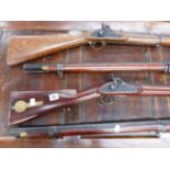 FOUR INDIAN PERCUSSION SERVICE MUSKETS AND A PERCUSSION CARBINE BY NICHOLSON. (5)