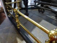 A VICTORIAN BRASS FIRE FENDER