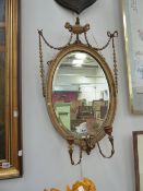 A PAIR OF ADAMS STYLE WALL MIRRORS