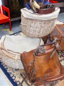 AN EXTREMELY LARGE PAIR OF CANVAS TOP WICKER PANNIERS.