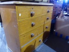 A VICTORIAN PINE CHEST OF DARWERS.