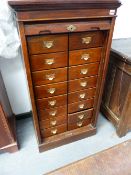 AN EARLY 20TH.C.LEBUS FILE CABINET OF SIXTEEN DRAWERS WITH TAMBOUR FRONT.