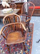 A HARLEQUIN SET OF EIGHT FRUITWOOD AND ELM WINDSOR ARMCHAIRS TO INCLUDE TWO WITH HIGH BACKS AND