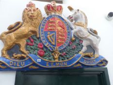 A LARGE ROYAL COAT OF ARMS WITH POLYCHROME DECORATION.