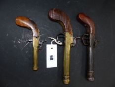 TWO BRASS CANNON BARRELED POCKET PISTOLS TOGETHER WITH ANOTHER SIMILAR. (3)
