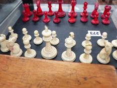 AN EARLY 20TH.C. IVORY STAUNTON PATTERN CHESS SET.