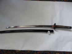 A JAPANESE KATANA, 67.5 cm BLADE WITH SIGNATURE AND TWO MEKUGI-ANA TO THE TANG. SQUARE IRON TSUBA