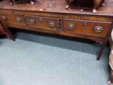 AN 18TH.C.AND LATER OAK THREE DRAWER DRESSER BASE.