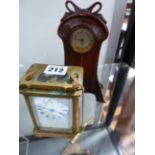 AN ART NOUVEAU CASED DRESSING TABLE CLOCK TOGETHER WITH A FRENCH BRASS CARRIAGE CLOCK