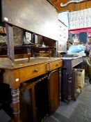 A LATE VICTORIAN PINE KITCHEN TABLE, A MAHOGANY GALLERY BACK WASHSTAND, AN OAK DROP LEAF TABLE AND A
