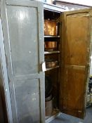A LARGE ANTIQUE PINE TWO DOOR CUPBOARD WITH SHELVED INTERIOR