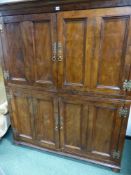AN ANTIQUE AND LATER SOLID YEW WOOD TWO DOOR HALL CABINET.