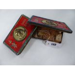 A BOER WAR SOUTH AFRICA 1900 CHRISTMAS GIFT BOX WITH CONTENTS INTACT AND A SIMILAR VACANT TIN