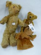 A SMALL STEIFF PLUSH JOINTED TEDDY BEAR WITH BUTTON TO EAR, AN UNNAMED JOINTED BEAR AND A GLOVE