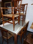 AN ANTIQUE PINE SCULLERY TABLE TOGETHER WITH EIGHT VARIOUS CANE AND RUSH SEAT CHAIRS