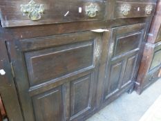 AN 18TH.C.OAK COURT CUPBOARD