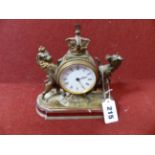 A LATE 19TH.C.GILT BRASS CASED DESK CLOCK FLANKED BY LION AND UNICORN AND SURMOUNTED WITH CROWN,