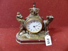 A LATE 19TH.C.GILT BRASS CASED DESK CLOCK FLANKED BY LION AND UNICORN AND SURMOUNTED WITH CROWN,