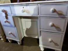 A VICTORIAN PAINTED PINE KNEEHOLE DRESSING TABLE