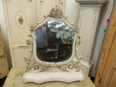 A 19TH.C.CARVED AND LATER PAINTED SWING DRESSING TABLE MIRROR.