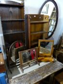 AN ARTS AND CRAFTS OAK SMALL BOOKCASE, THREE SWING MIRRORS AND A PINE DROP LEAF KITCHEN TABLE