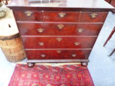 AN 18TH.C.WALNUT AND CROSSBANDED CHEST OF DRAWERS ON BUN FEET.