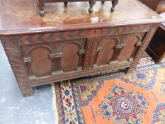 AN 18TH.C.OAK COFFER WITH CARVED AND INLAID DECORATION.