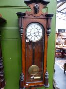 A VICTORIAN WALNUT CASED VIENNA WALL CLOCK WITH SINGLE TRAIN WEIGHT DRIVEN MOVEMENT.