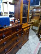 A VICTORIAN MAHOGANY GLAZED BOOKCASE ON CABINET TOGETHER WITH A VICTORIAN FLAME MAHOGANY CHEST OF