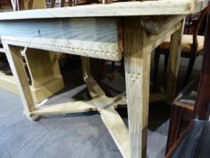 A CONTINENTAL OAK CENTRE TABLE WITH FRIEZE DRAWER