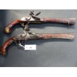 A BRACE OF FLINTLOCK BLUNDERBUSS PISTOLS OF EASTERN ORIGIN, EACH WITH FLARED MUZZLE, FULL STOCKS