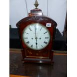 A REGENCY MAHOGANY AND BRASS INLAID BRACKET CLOCK WITH PAINTED DIAL SIGNED UNTHANK, STOKESLEY.