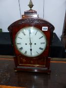 A REGENCY MAHOGANY AND BRASS INLAID BRACKET CLOCK WITH PAINTED DIAL SIGNED UNTHANK, STOKESLEY.