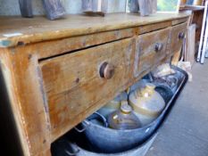 A 19TH.C.PINE THREE DRAWER DRESSER BASE