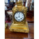 A 19TH.C.FRENCH BRONZE ORMOLU MANTLE CLOCK WITH ENAMEL DIAL AND BELL STRIKE MOVEMENT.