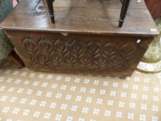 AN EARLY 17TH.C.AND LATER OAK PLANK COFFER WITH IRON STRAP HINGES.