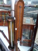 A 19TH.C.FRUITWOOD MOUNTED THERMOMETER BY THOMAS RUBBERGALL, LONDON AND A COPPER AND BRASS EXAMPLE