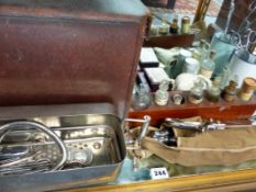 A COLLECTION OF VINTAGE SURGICAL EQUIPMENT IN A LEATHER CASE.