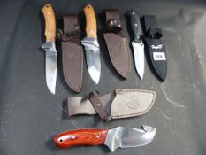 FOUR MODERN SHEATH KNIVES