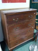 A GEO.III.OAK CHEST OF FOUR DRAWERS THE UPPER DRAWER WITH PIGEONHOLES AND COMPARTMENTS.