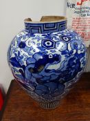 AN EASTERN BLUE AND WHITE POTTERY BALUSTER VASE IN THE JAPANESE STYLE/ H.37cms.