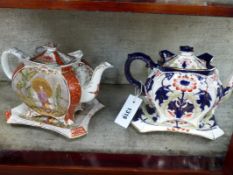 TWO BURGESS & LEIGH VICTORIAN POTTERY TEAPOTS AND STANDS, ONE WITH FLORAL POLYCHROME DECORATION, THE