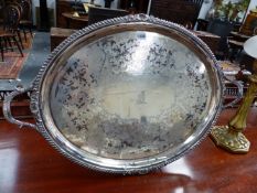 A SILVER TWO HANDLED OVAL TRAY WITH GADROON RIM, ENGRAVED CENTRE FIELD WITH LION ARMORIAL. LONDON