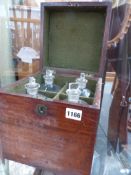 AN EARLY 19TH.C.MAHOGANY FOUR BOTTLE DECANTER BOX WITH RECESSED CARRYING HANDLES CONTAINING FOUR