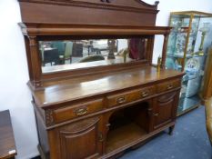 A LATE VICTORIAN OAK MIRROR BACK SIDE BOARD