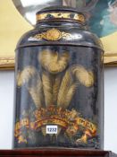 A 19TH.C.TOLEWARE TEA CANNISTER WITH PRINCE OF WALES DECORATION AND MAKER'S LABEL TO REVERSE. H.